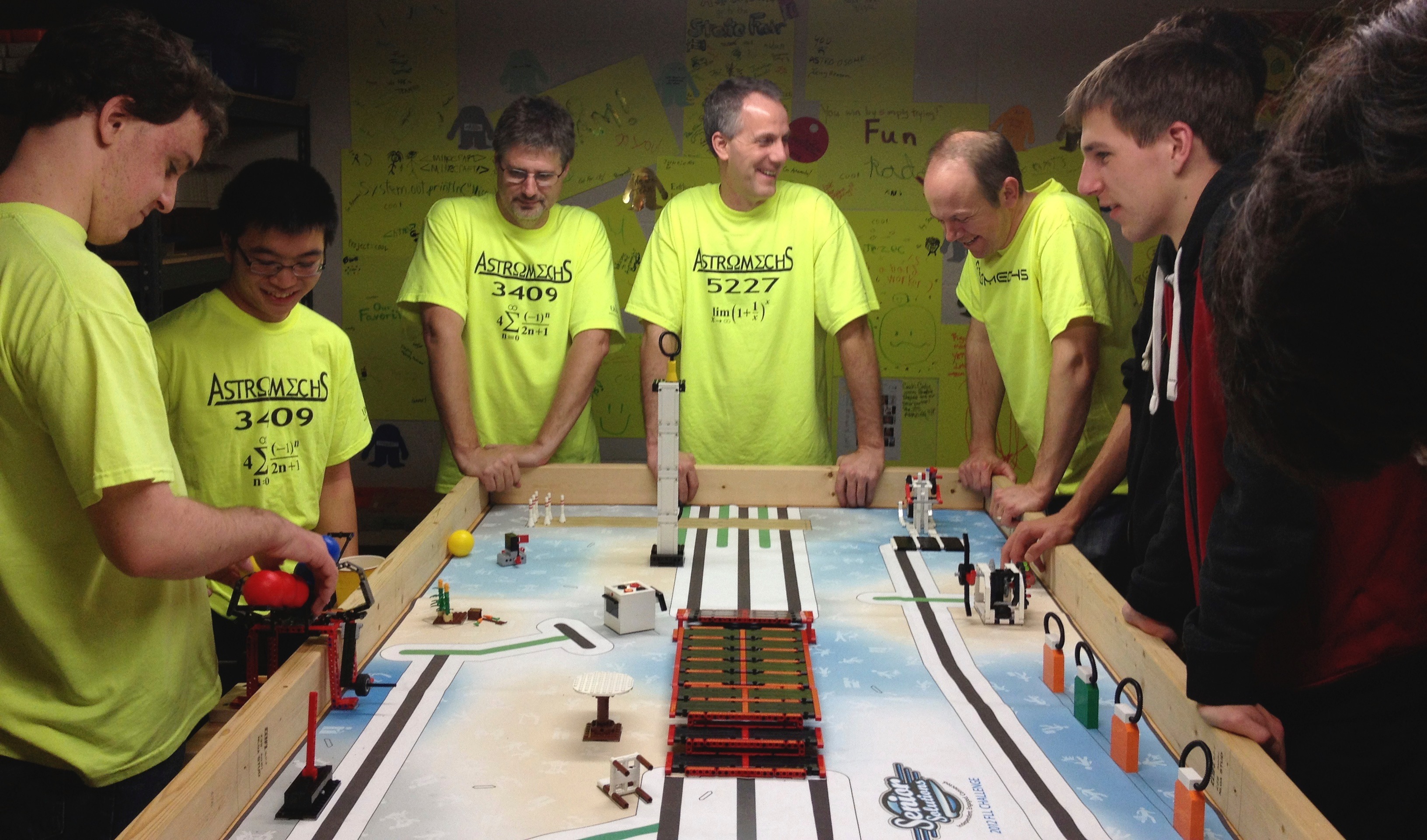 Students building and working with robotics
